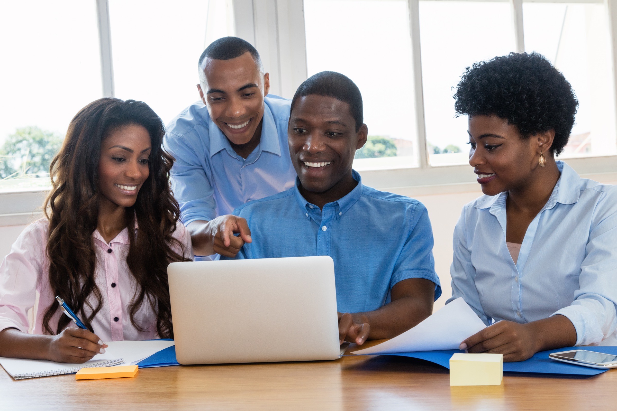 Professionals collaborating around financial information